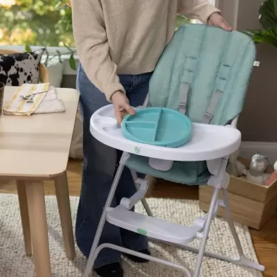 INGENUITY Chaise haute compacte, avec assiette sécurisée, pliage a p