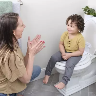 INGENUITY Réducteur de Toilette Flip & Sit